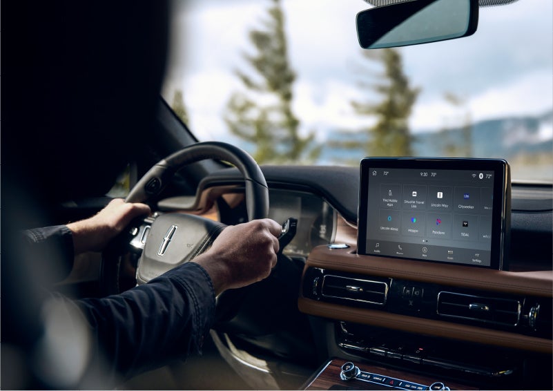The Lincoln+Alexa app screen is displayed in the center screen of a 2023 Lincoln Aviator® Grand Touring SUV | Vision Lincoln in Wahpeton ND