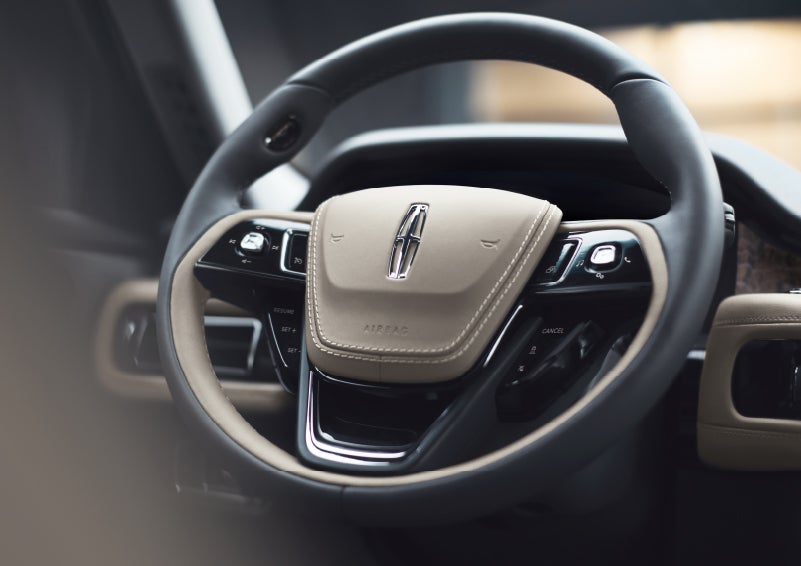 The intuitively placed controls of the steering wheel on a 2024 Lincoln Aviator® SUV | Vision Lincoln in Wahpeton ND
