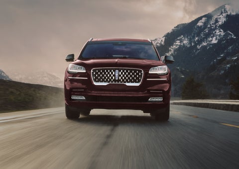 A 2024 Lincoln Aviator® SUV is shown in the Diamond Red exterior color. | Vision Lincoln in Wahpeton ND