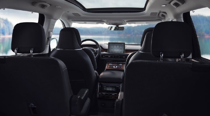 The interior of a 2024 Lincoln Aviator® SUV from behind the second row | Vision Lincoln in Wahpeton ND